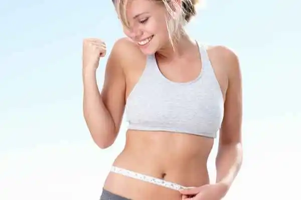 woman happy after fat reduction treatment Horsham